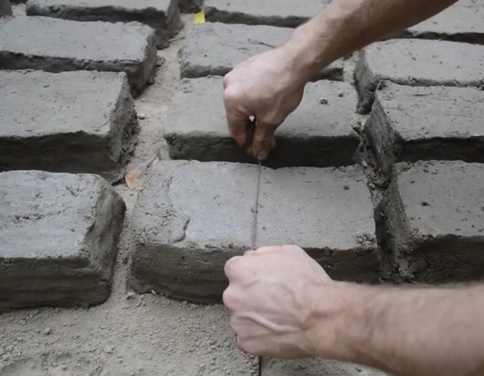 Watching a man make mud bricks using primitive technology is just ...