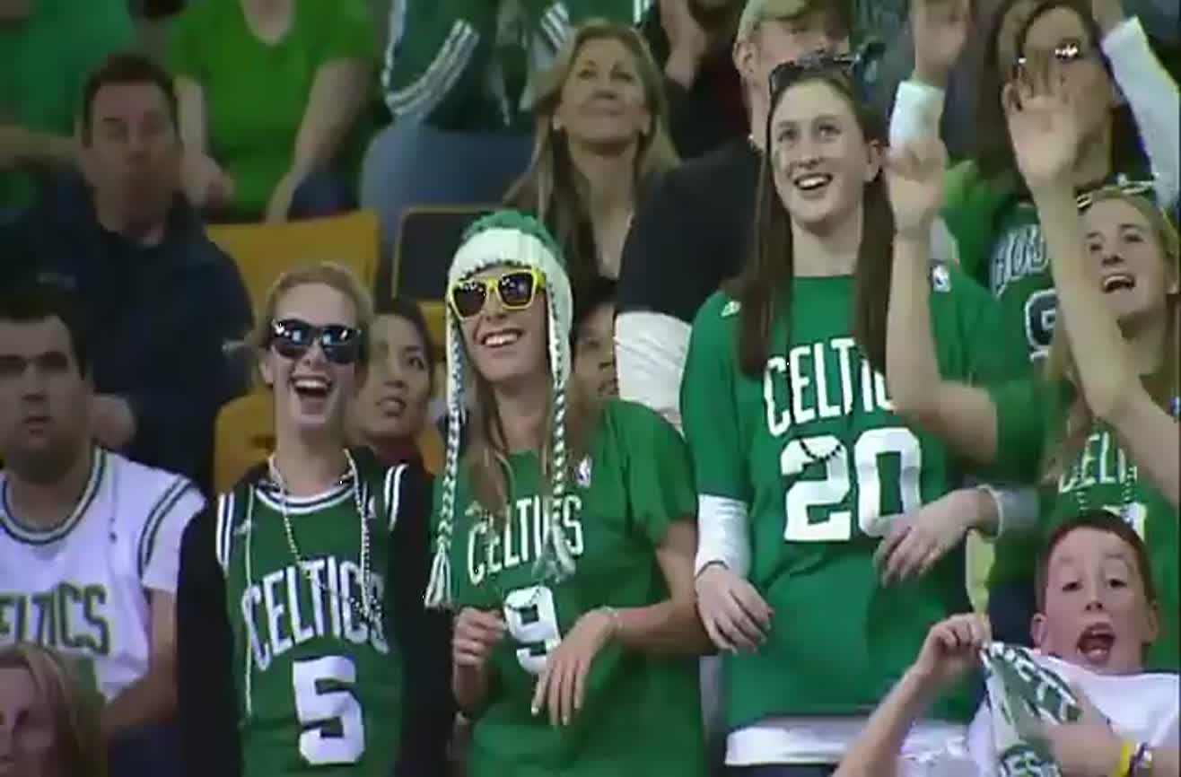 Celtics fan dances epically.