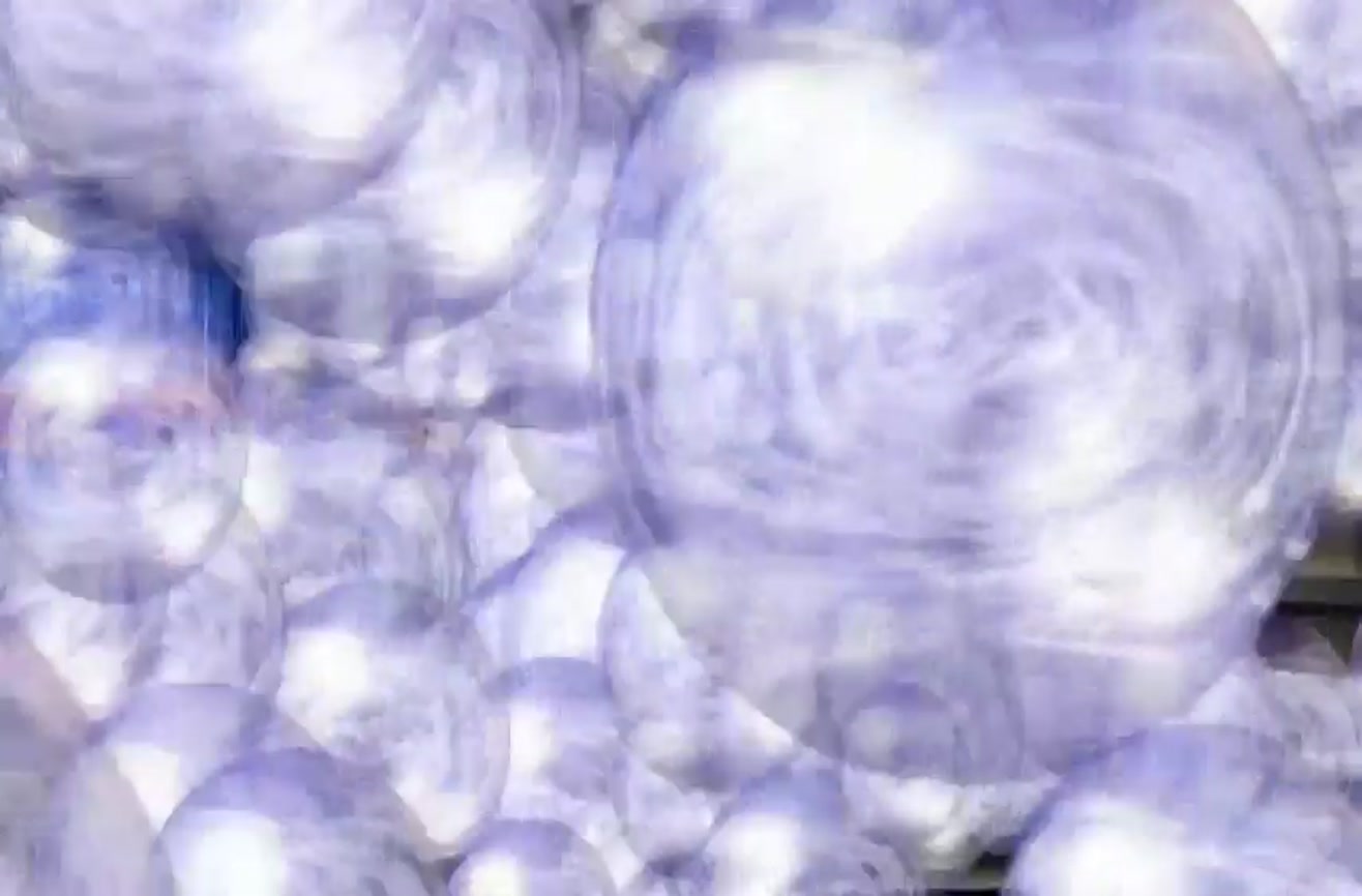 How to open a pre-shaken soda can without it exploding.