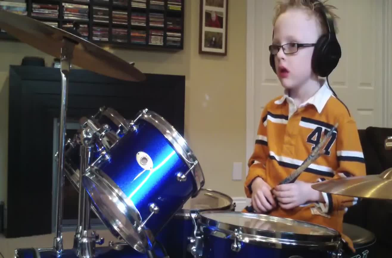 A six-year-old self-taught drummer.