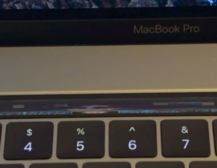 Playing "DOOM" on the MacBook touch bar.