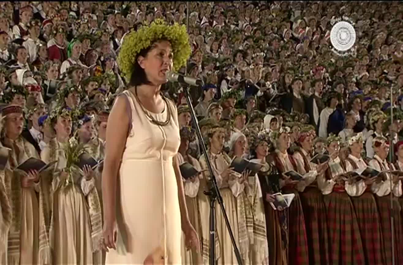 Singer From Riga 15,000 people sing at a Latvian song and dance festival.