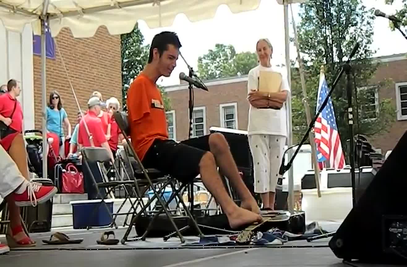 Armless guitar player Dennehy.