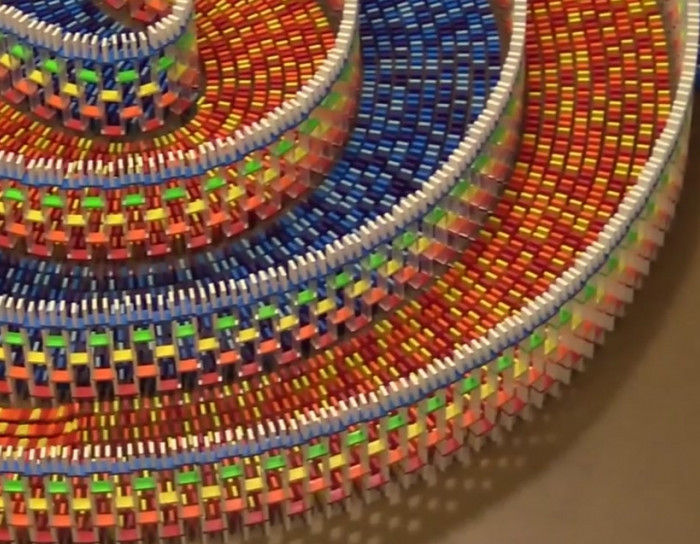 15,000 dominoes, 25 hours, and one huge spiral.