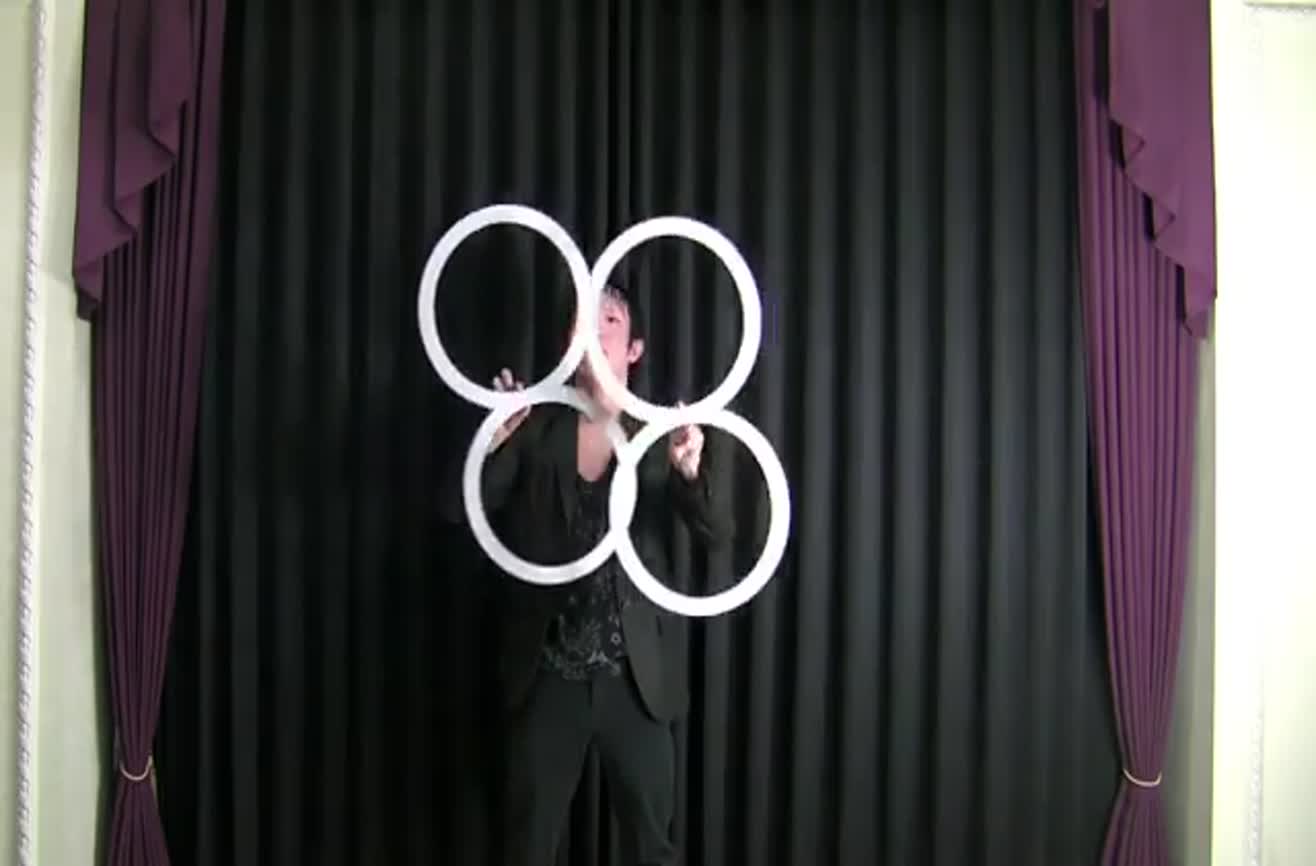 Contact juggling with rings.