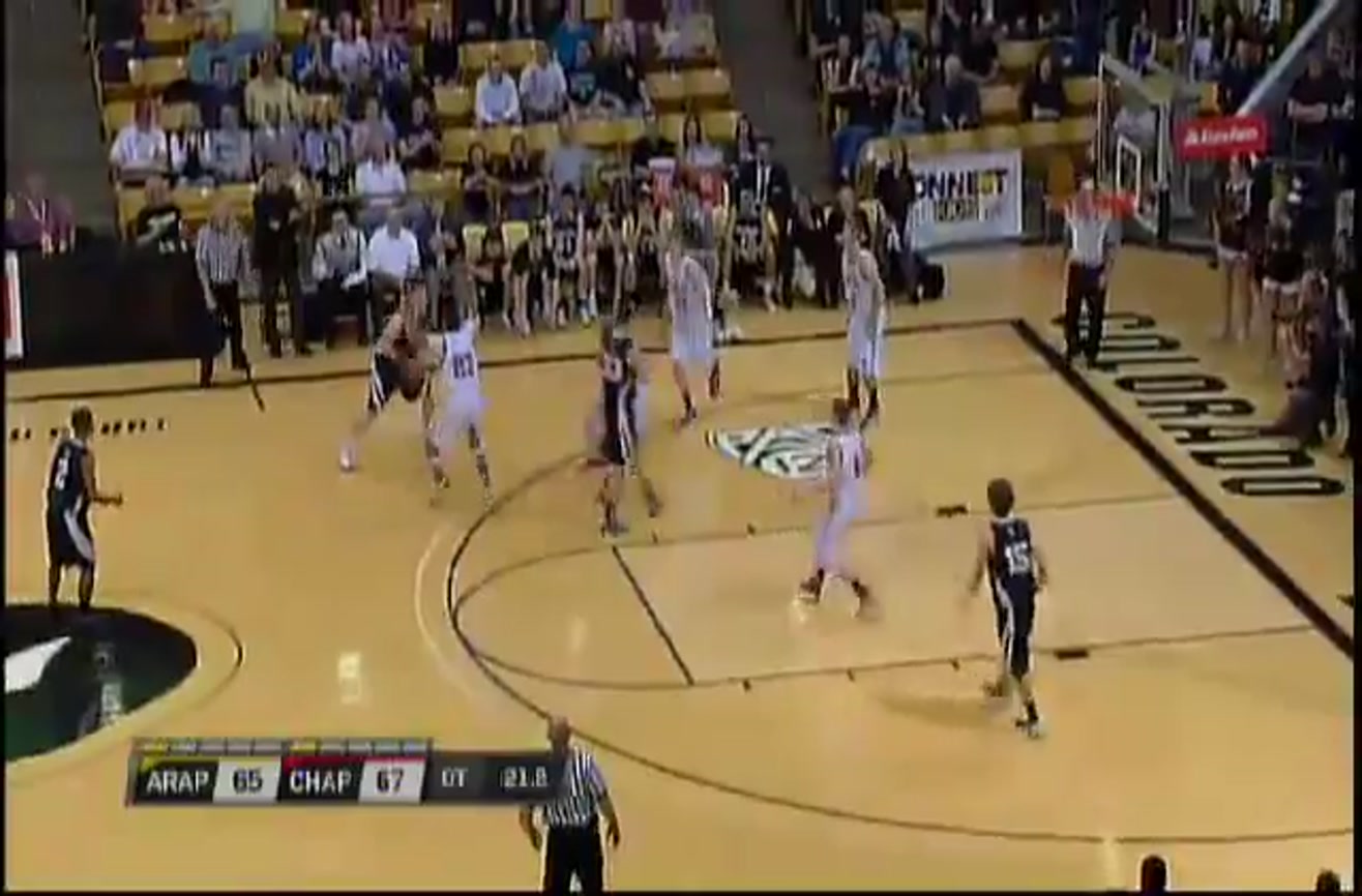 High school basketball Tipin to win in overtime.