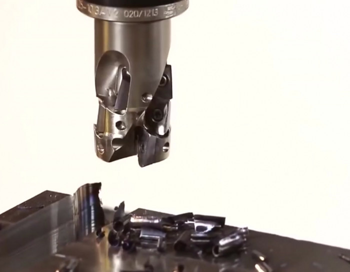 Watching this machine carve metal is absolutely hypnotic.