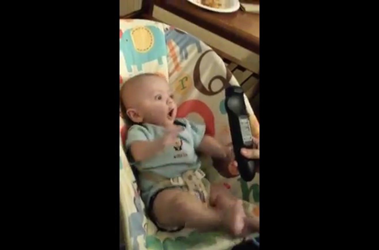 Baby has the best reaction to a TV remote.
