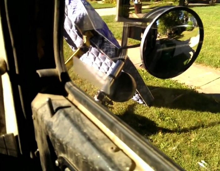 This garbage man loves his job.