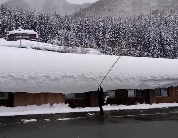 A super fun way to clean snow off your roof.