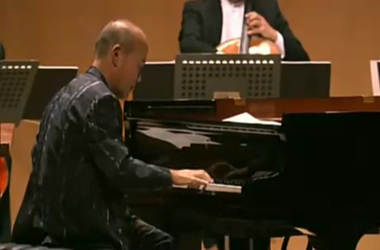 Joe Hisaishi Piano and nine cellos.