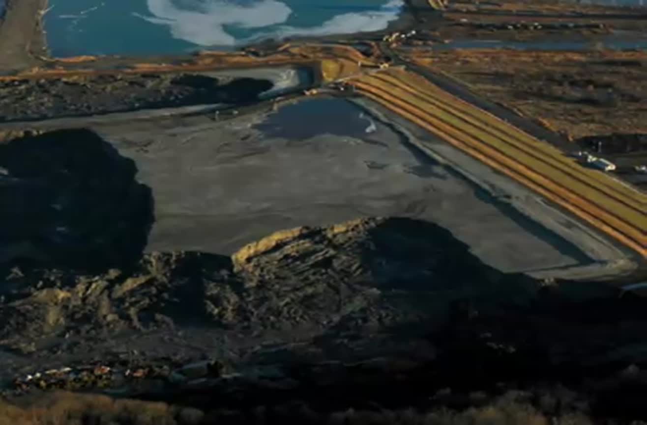 Coal sludge spill devastates town.