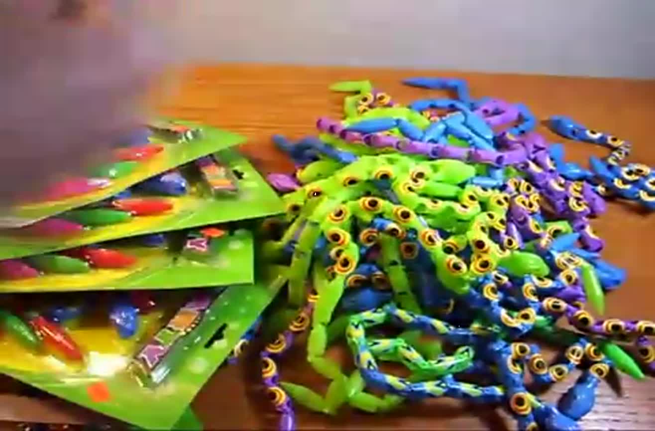 toy snakes that grow in water