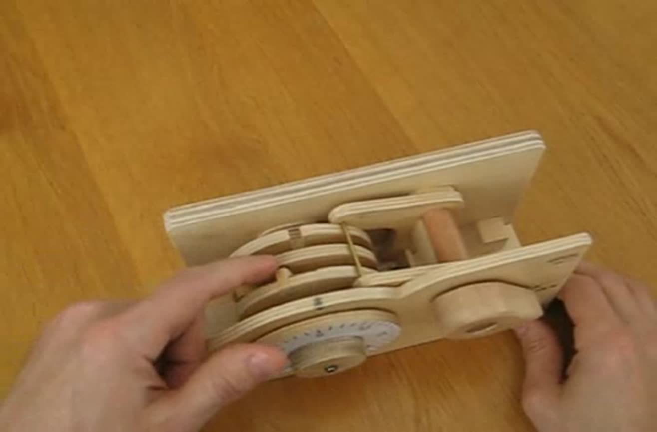 Wooden combination lock.