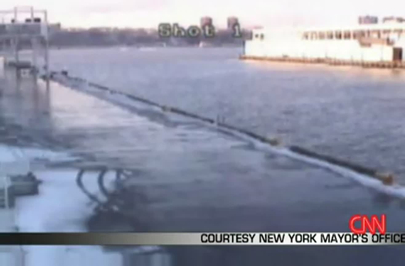 Multiple shots of the plane landing in Hudson River, NY.