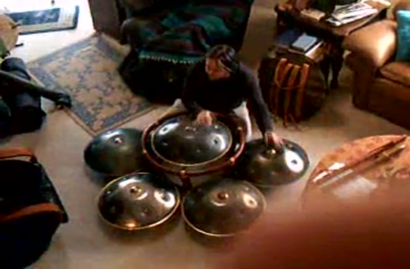 Hang drums are set at different positions in a circular pattern to