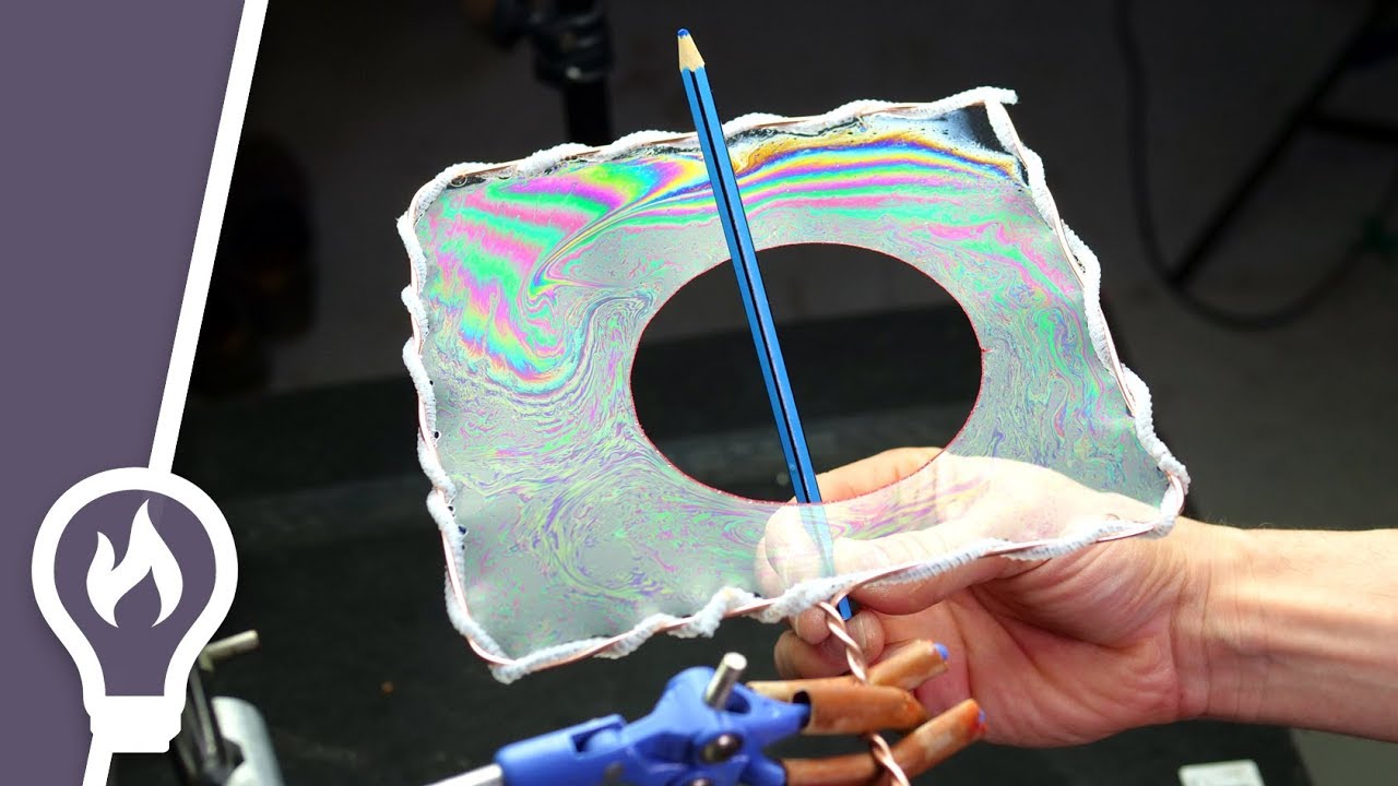 This 'inverted bubble' trick lets you poke holes through soap foam