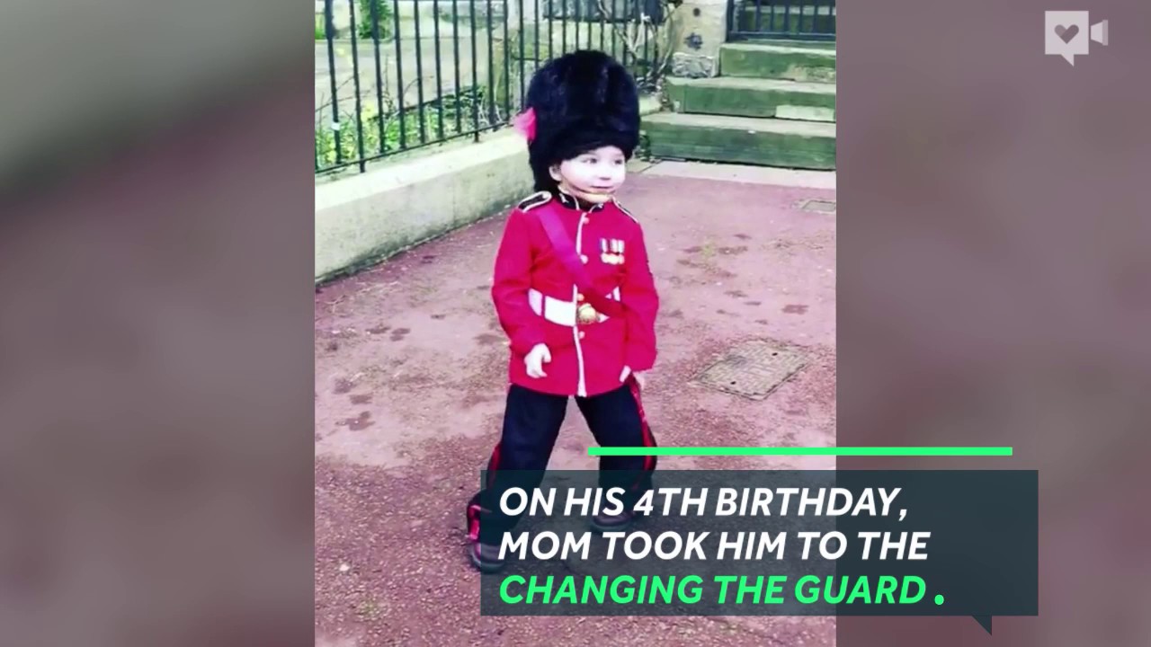 Queen's guard breaks formation for little boy