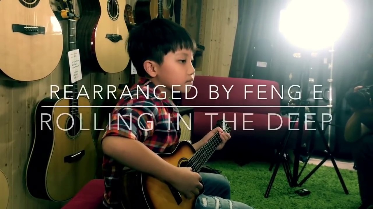 Little kid plays ukulele cover of 'Rolling in the Deep' by Adele