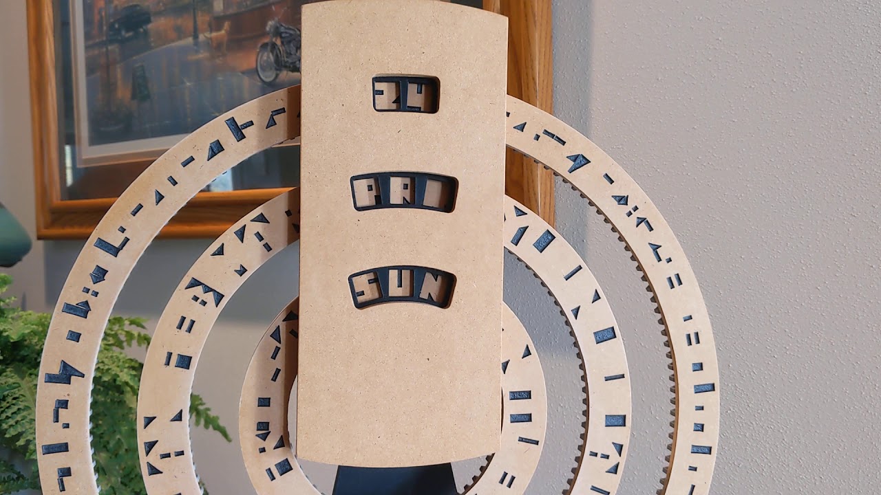 Clever automated clock that displays date, month, and day of