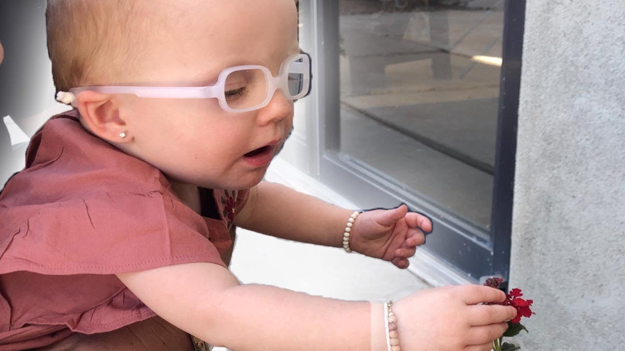 Baby gets first pair of glasses.