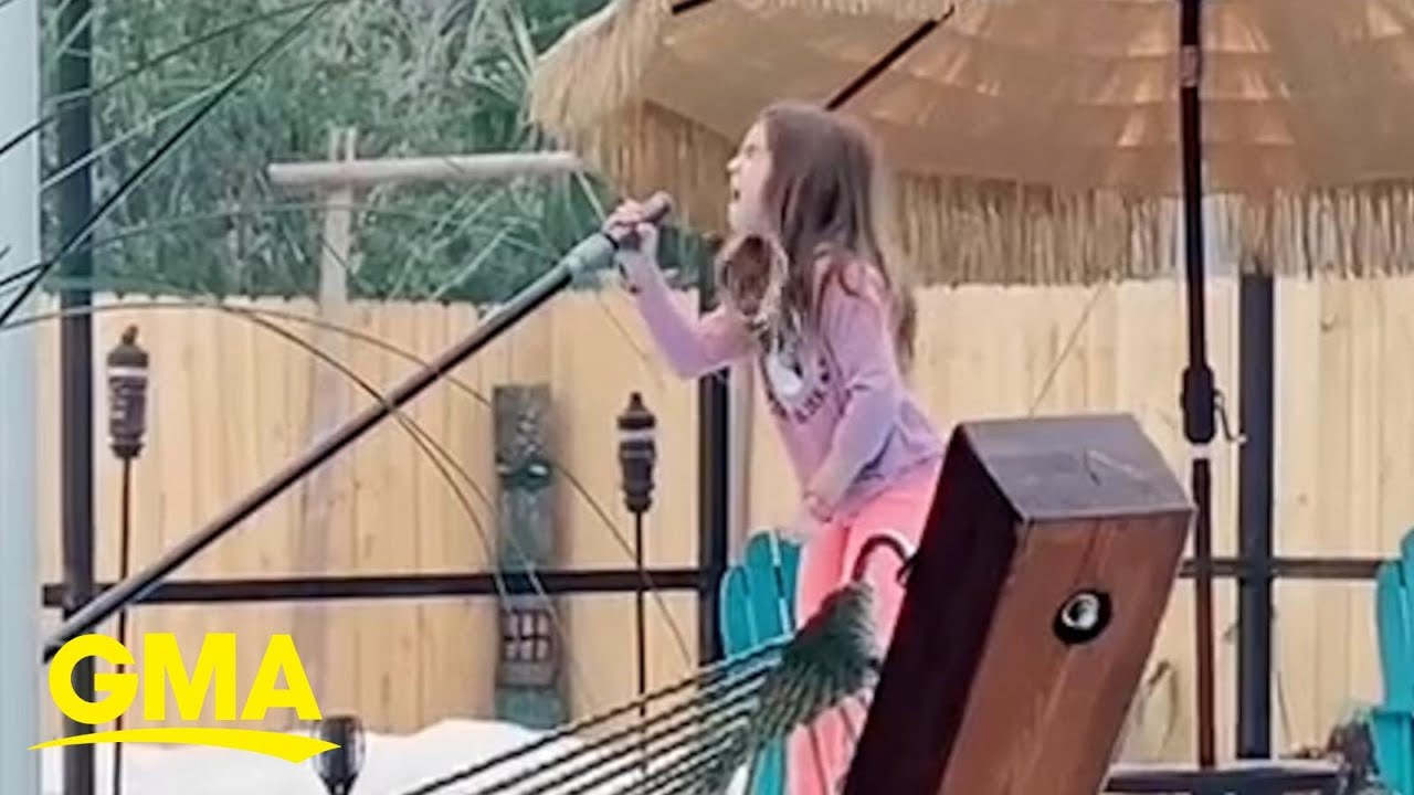 Dad records daughter singing 'Girl on Fire.'