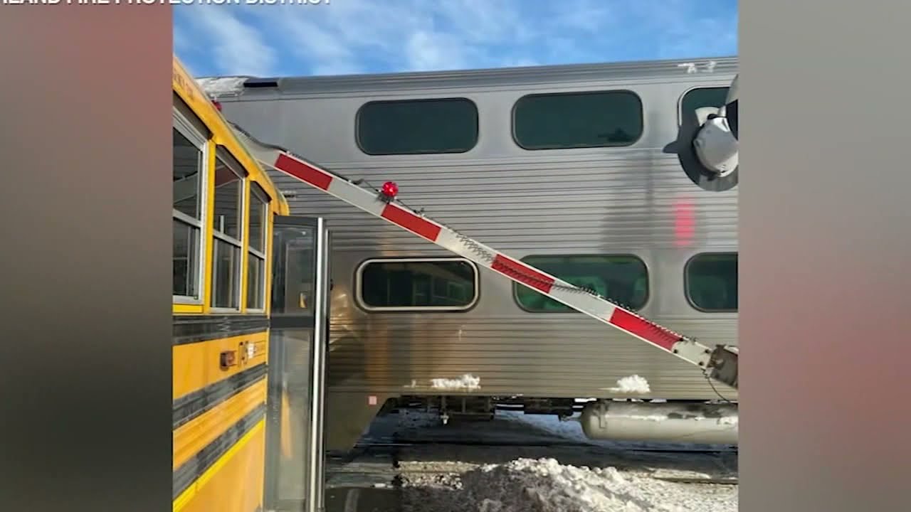 School Bus Driver Stops Seconds Before Train Crash