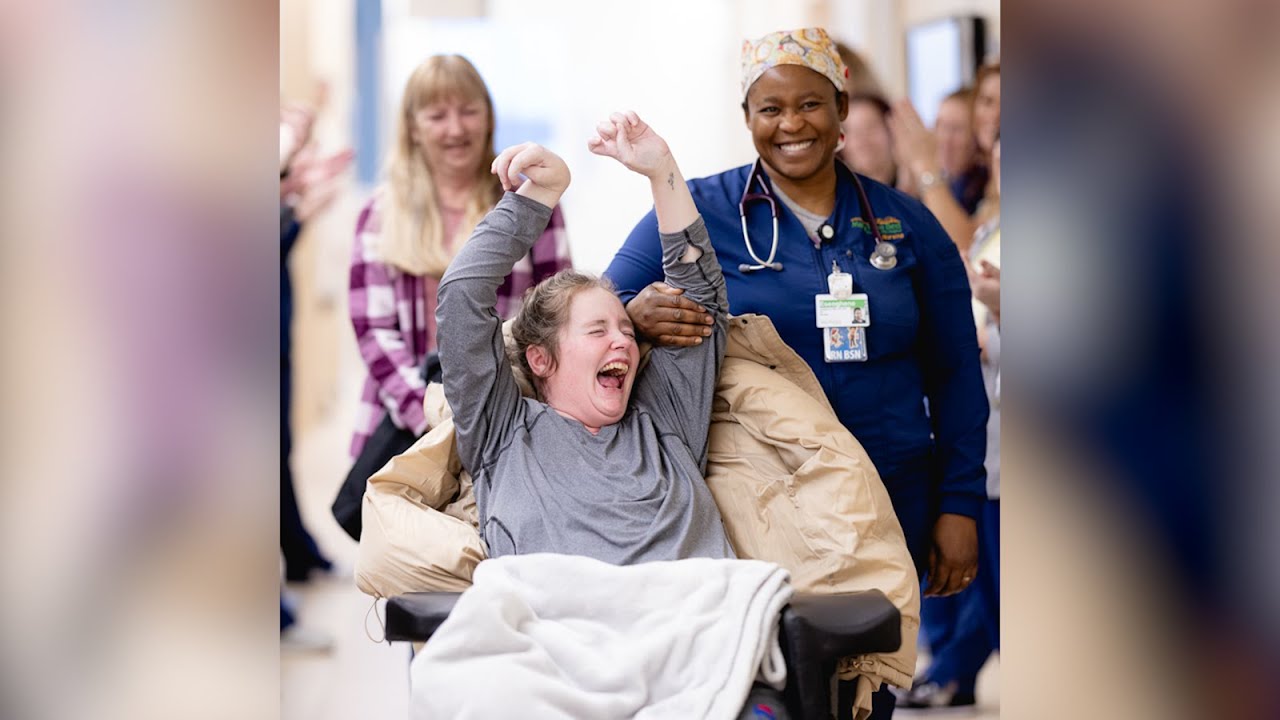 Woman wakes from coma after 5 years.