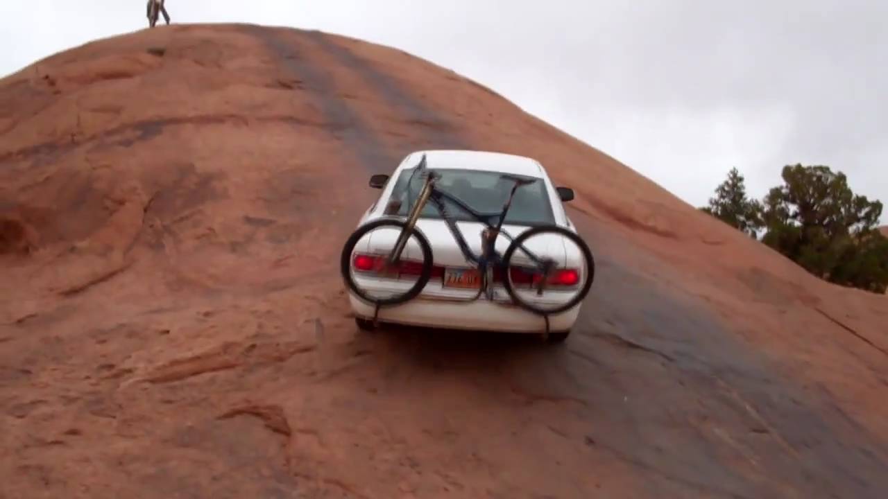 Mowam Rocks Crown Victoria takes on Moab rock.